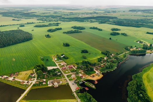 view from the height of the Lake in a green field in the form of a horseshoe and a village in the Mogilev region.Belarus.The Nature Of Belarus.