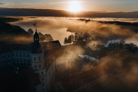 Nesvizh castle is a residential castle of the Radziwill family in Nesvizh, Belarus, with a beautiful view from above at dawn.