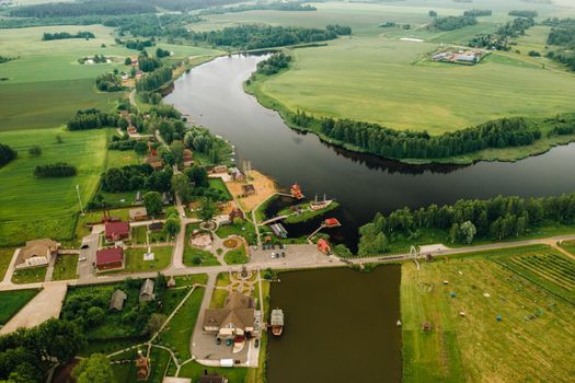 view from the height of the Lake in a green field in the form of a horseshoe and a village in the Mogilev region.Belarus.The Nature Of Belarus.