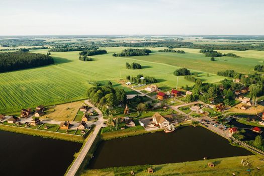 view from the height of the Lake in a green field in the form of a horseshoe and a village in the Mogilev region.Belarus.The Nature Of Belarus.