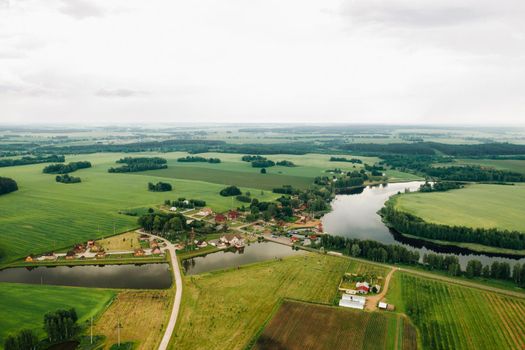 view from the height of the Lake in a green field in the form of a horseshoe and a village in the Mogilev region.Belarus.The Nature Of Belarus.