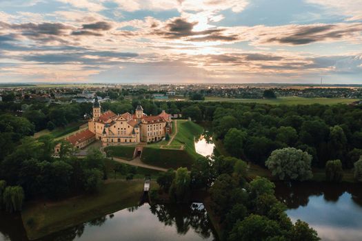 Beautiful golden sunrise near the Palace in Nesvizh, Minsk region, Belarus.