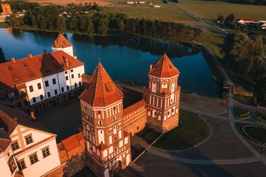 Mir castle with spires near the lake top view in Belarus near the city of Mir.