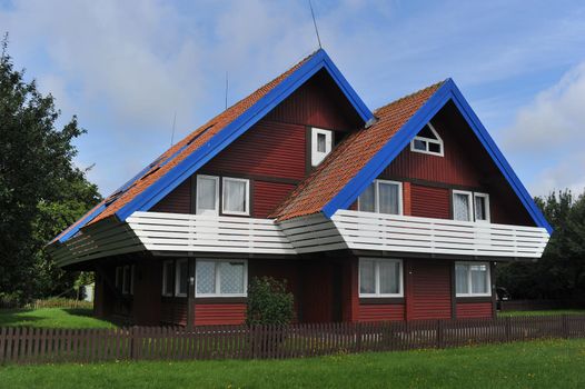 Nida Lithuania Beautiful old Lithuanian traditional wooden ouse in Nida, Lithuania, Europe.