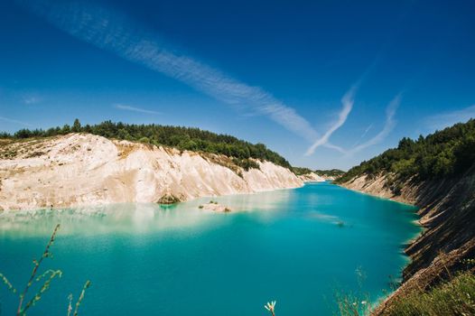 Volkovysk chalk pits or Belarusian Maldives beautiful saturated blue lakes. Famous chalk quarries near Vaukavysk, Belarus. Developed for the needs of Krasnaselski plant construction materials.