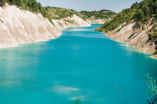 Volkovysk chalk pits or Belarusian Maldives beautiful saturated blue lakes. Famous chalk quarries near Vaukavysk, Belarus. Developed for the needs of Krasnaselski plant construction materials.