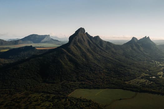 Aerial view of mountains and fields in Mauritius island.