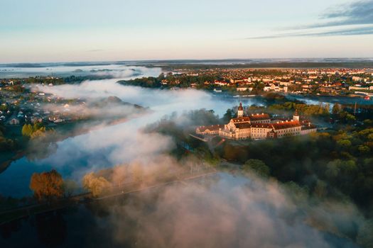 Nesvizh castle is a residential castle of the Radziwill family in Nesvizh, Belarus, with a beautiful view from above at dawn.