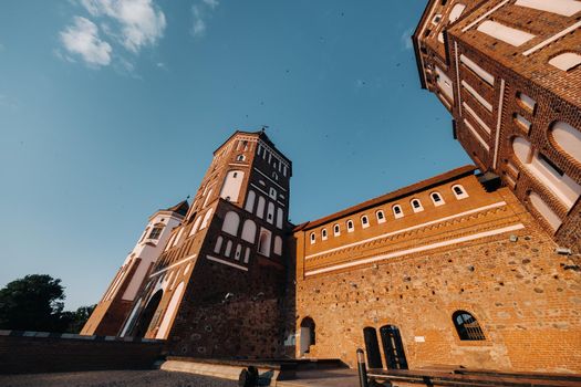 Mir castle with spires near the lake bottom view in Belarus near the city of Mir.