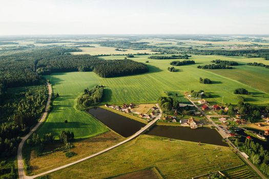 view from the height of the Lake in a green field in the form of a horseshoe and a village in the Mogilev region.Belarus.The Nature Of Belarus.