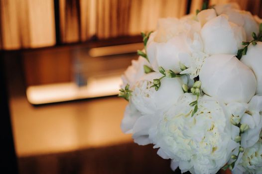 wedding bouquet with peonies at the wedding.Beautiful bouquet of flowers.