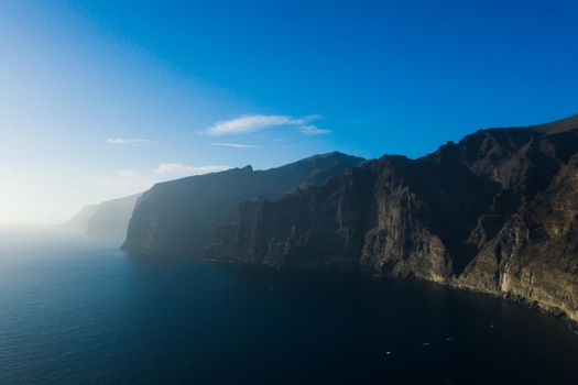 Aerial panorama of Acantilados de Los Gigantes Cliffs of the Giants at sunset, Tenerife, Canary islands, Spain