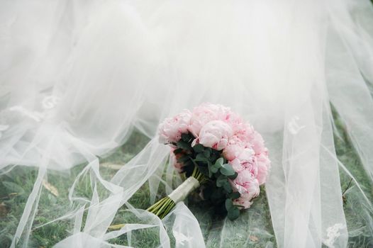 wedding bouquet with peonies at the wedding.Beautiful bouquet of flowers.