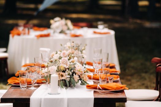 wedding table decoration with flowers on the table, dinner table decor.