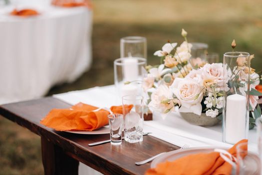wedding table decoration with flowers on the table, dinner table decor.
