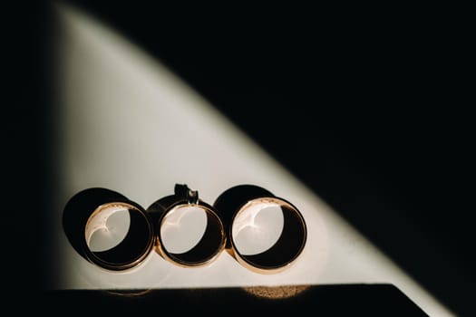 Close-up of two gold wedding rings for a wedding.