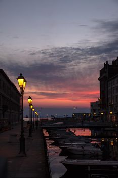 View of Ponte rosso in Trieste at sunset, Italy