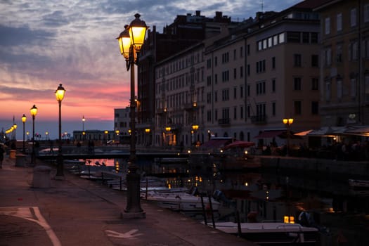View of Ponte rosso in Trieste at sunset, Italy