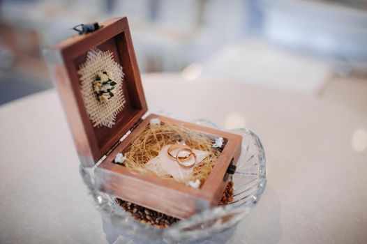 Wedding rings in the jewelry box at the wedding ceremony.