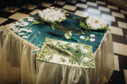 wedding table decoration with flowers on the table in green style, dinner table decor.