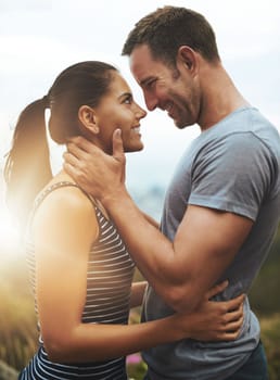 Falling in love and it feels so good. a young couple enjoying a romantic day outdoors