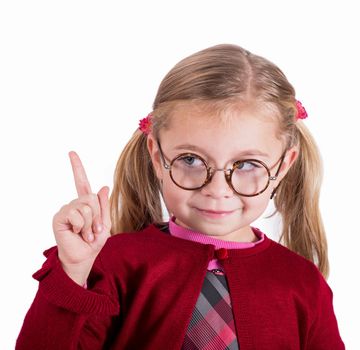 Close-up portrait of little girl wearing glasses in retro style