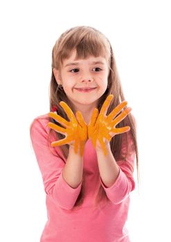 Children's painting. Little girl draws the sun.The girl painted the sun on her palms Arts and crafts for children. Paint on children's hands. Isolated on a white background