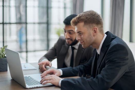 Businessman discussing project with colleague