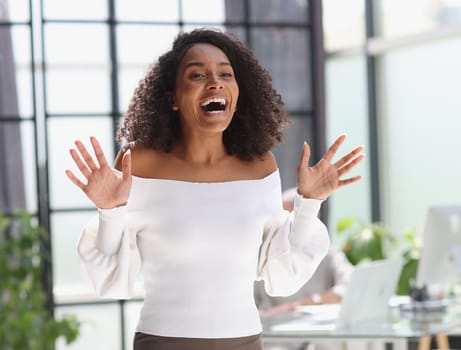 Portrait of a young attractive African American woman in the office