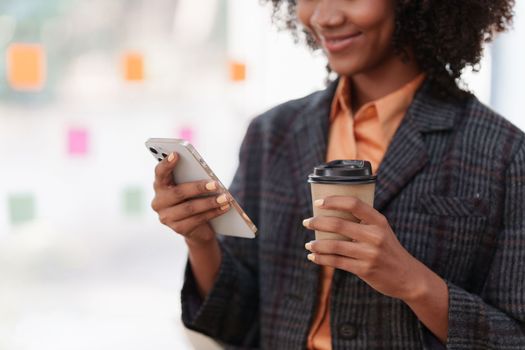 Accountant black woman working on smartphone and do document, tax, exchange, accounting and Financial advisor concept.