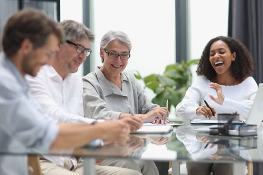 Conversation between managers and employees in the office