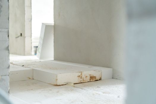 insulation of floors with polystyrene on the construction site. High quality photo