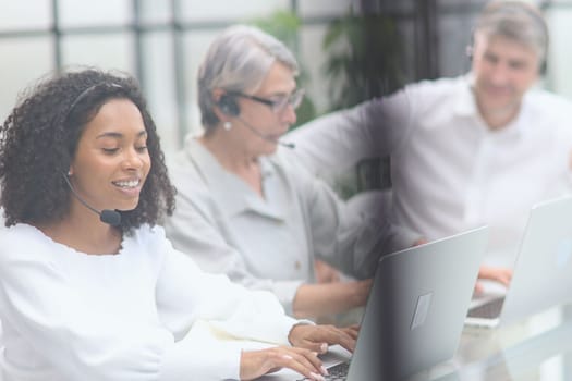 Business group working in customer and help desk office.