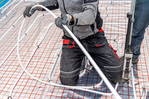 installation of underfloor heating in a new building.