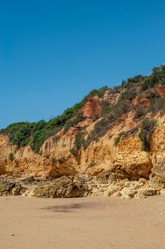 Maria Luisa beach with rock formation in Albufeira, Algarve, Portugal.