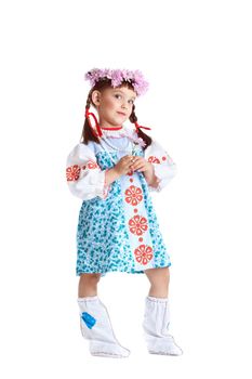 Full length portrait of little girl in slavic costume and wreath of flowers. Isolated on white