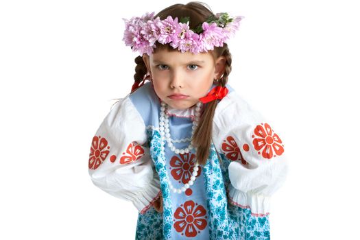 Portrait of little girl in slavic costume and wreath of flowers. Isolated on white