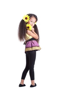 Full length portrait of fashion asian little girl with sunflowers in gorgeous hairs. Isolated on white