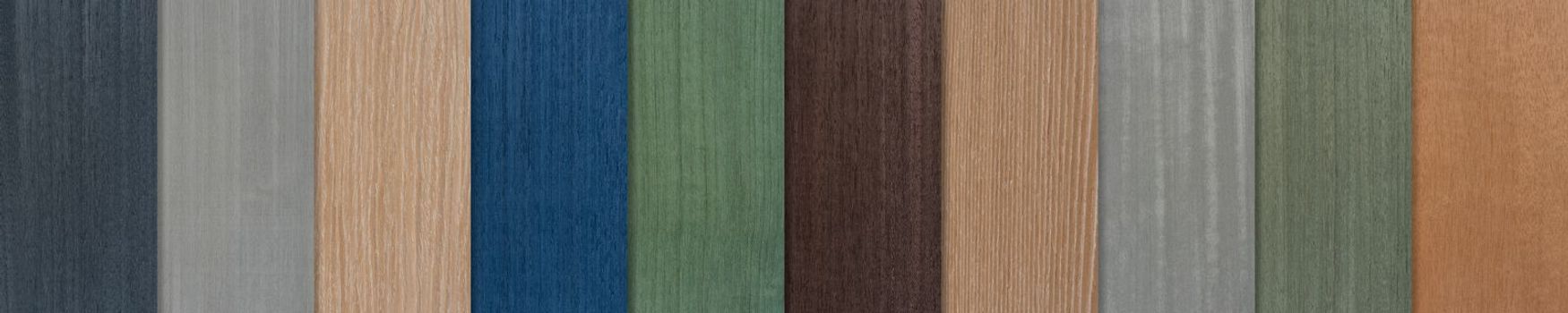 Samples of wood of different species. Pieces of exotic wood veneer in different shades and textures. Samples of wood for the production of floor furniture or doors, top view