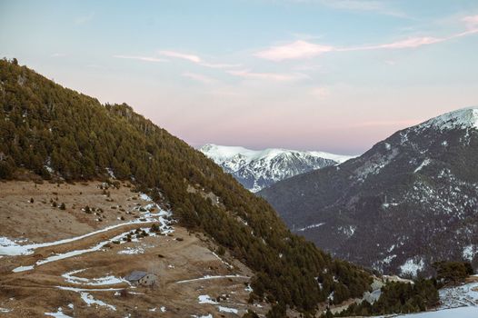 Mountains in the Pyrenees in Andorra in winter with lots of snow.