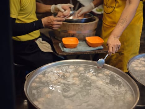 Boiled meat ball hond made . THAI food .