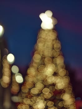 Blur light celebration on christmas tree with bokeh background