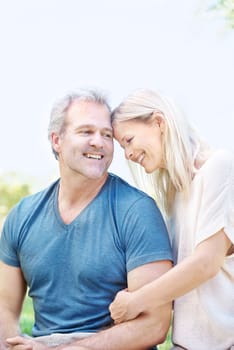 Sharing a sense of humor. A happy mature couple spending time with each other outdoors