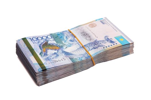 Bundle of Kazakhstan banknotes of 10000 tenge tied with an elastic band, isolated on white.