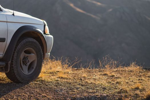 Travel car concept with 4x4 SUV car in nature, copy space.