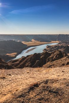 Ili river view in rocky gorge, Almaty region, Kazakhstan nature landscape, vertical and copy space