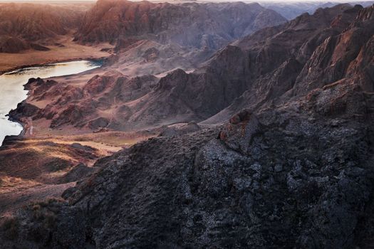 Rocky picturesque landscape at dawn on the Ili River in the Gorge in the Almaty region. of Kazakhstan.