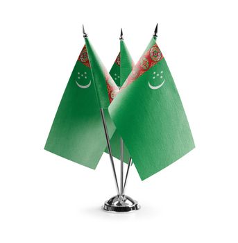Small national flags of the Turkmenistan on a white background.