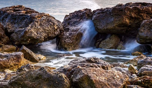 Scenic view of rocks in sea