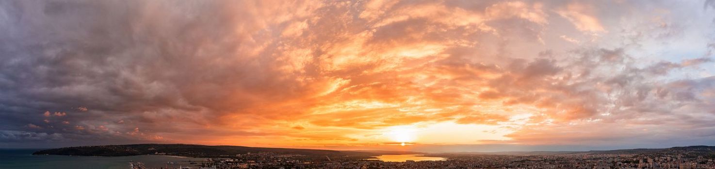 Stunning aerial panoramic view of the sunset over the city Varna, Bulgaria. 